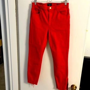 Women’s red frayed ankle denim pants